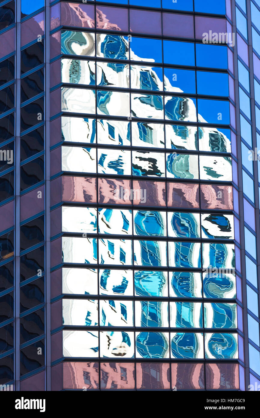 USA, New York, Distorted reflections in Glass building Stock Photo