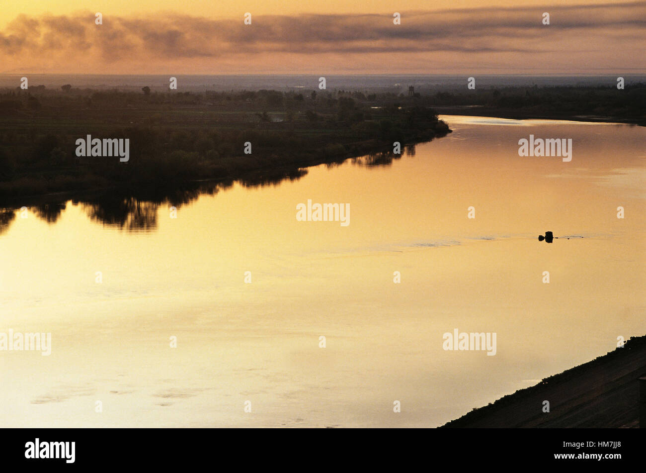 The Euphrates river at sunset near Deir ez-Zor, Syria. Stock Photo