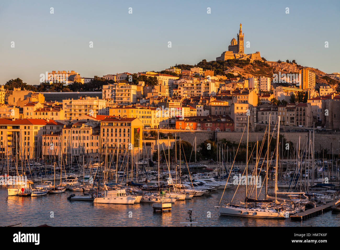 France, Provence-Alpes-Cote d'Azur, Marseille, Notre-Dame de la Garde above Vieux port - Old Port Stock Photo