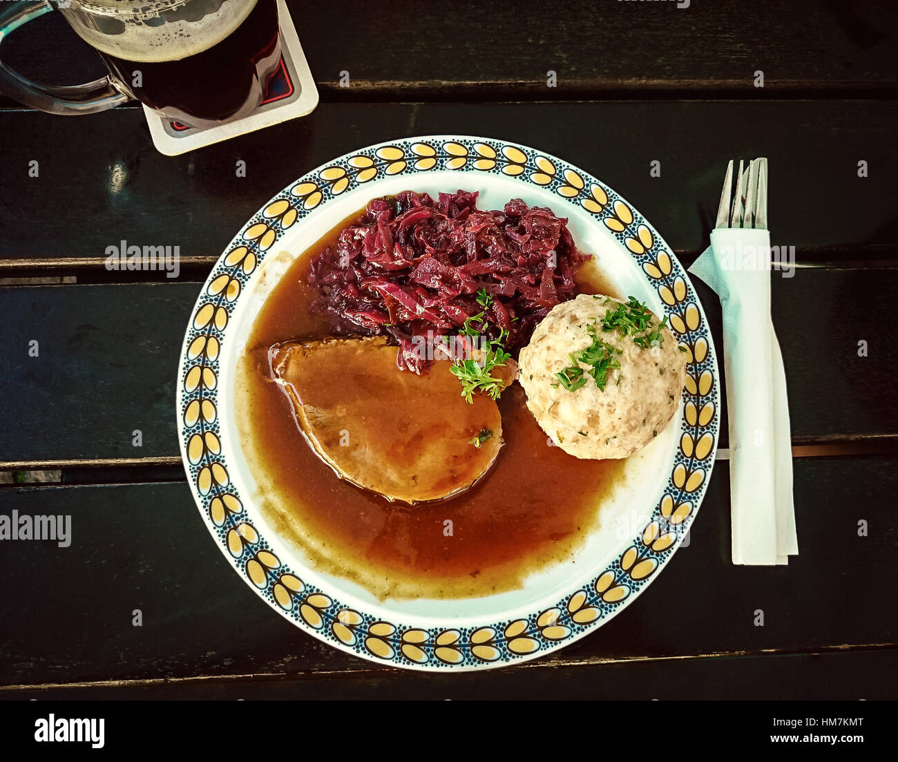 Bavarian Sauerbraten of beef with red cabbage and bread dumplings Stock Photo