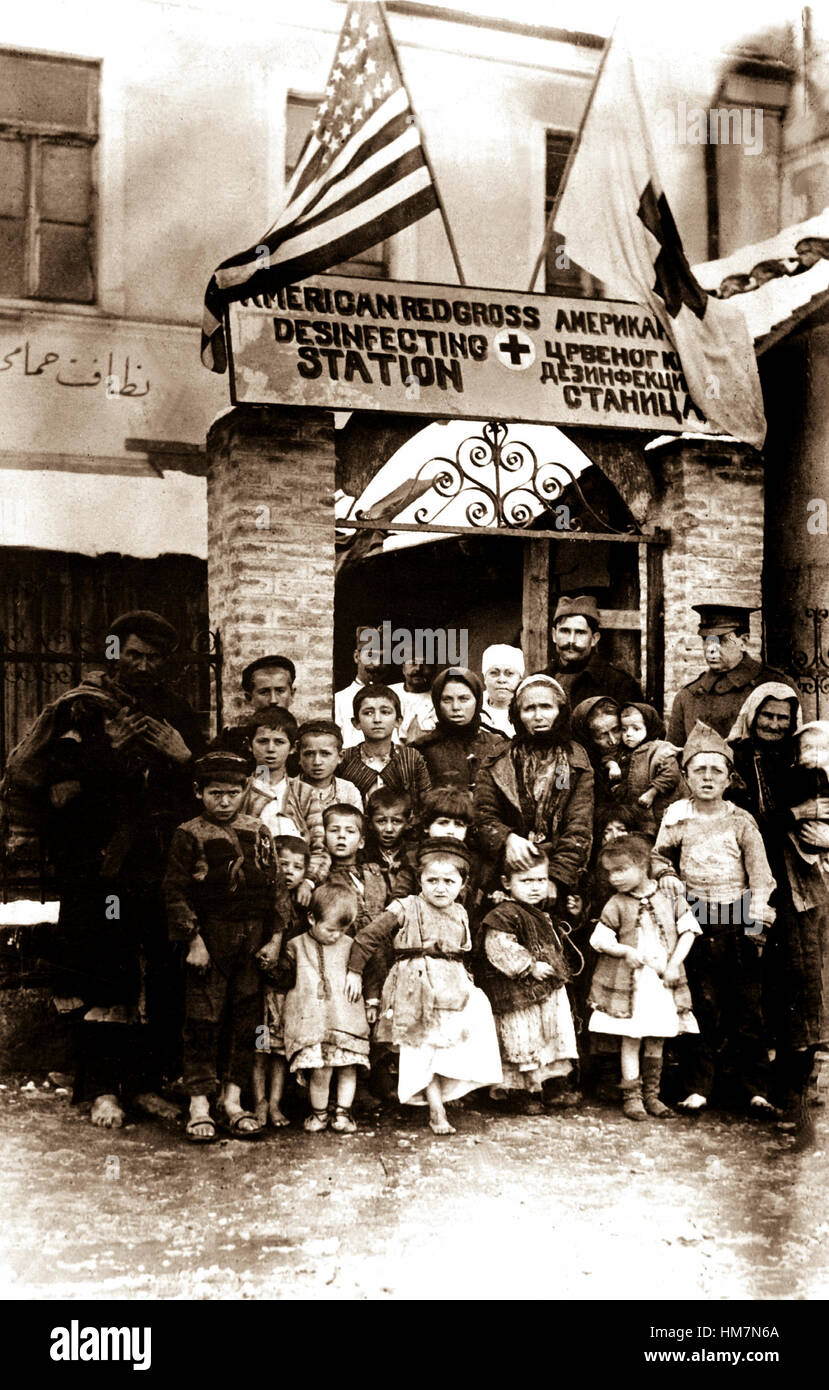 Refugees of Serbia entering Uskut showing the disheartened men, women, and children as they streamed in.  Ca. 1917-19.  American Red Cross. (War Dept.)  Exact Date Shot Unknown NARA FILE #:  165-WW-181B-3 WAR & CONFLICT BOOK #:  680 Stock Photo