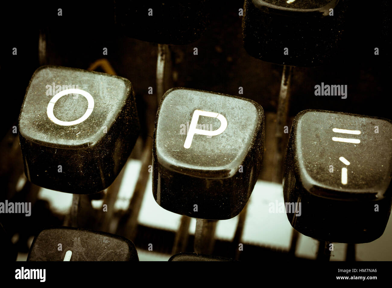 P letter closeup between other letters on an original vintage typewriter's keyboard Stock Photo