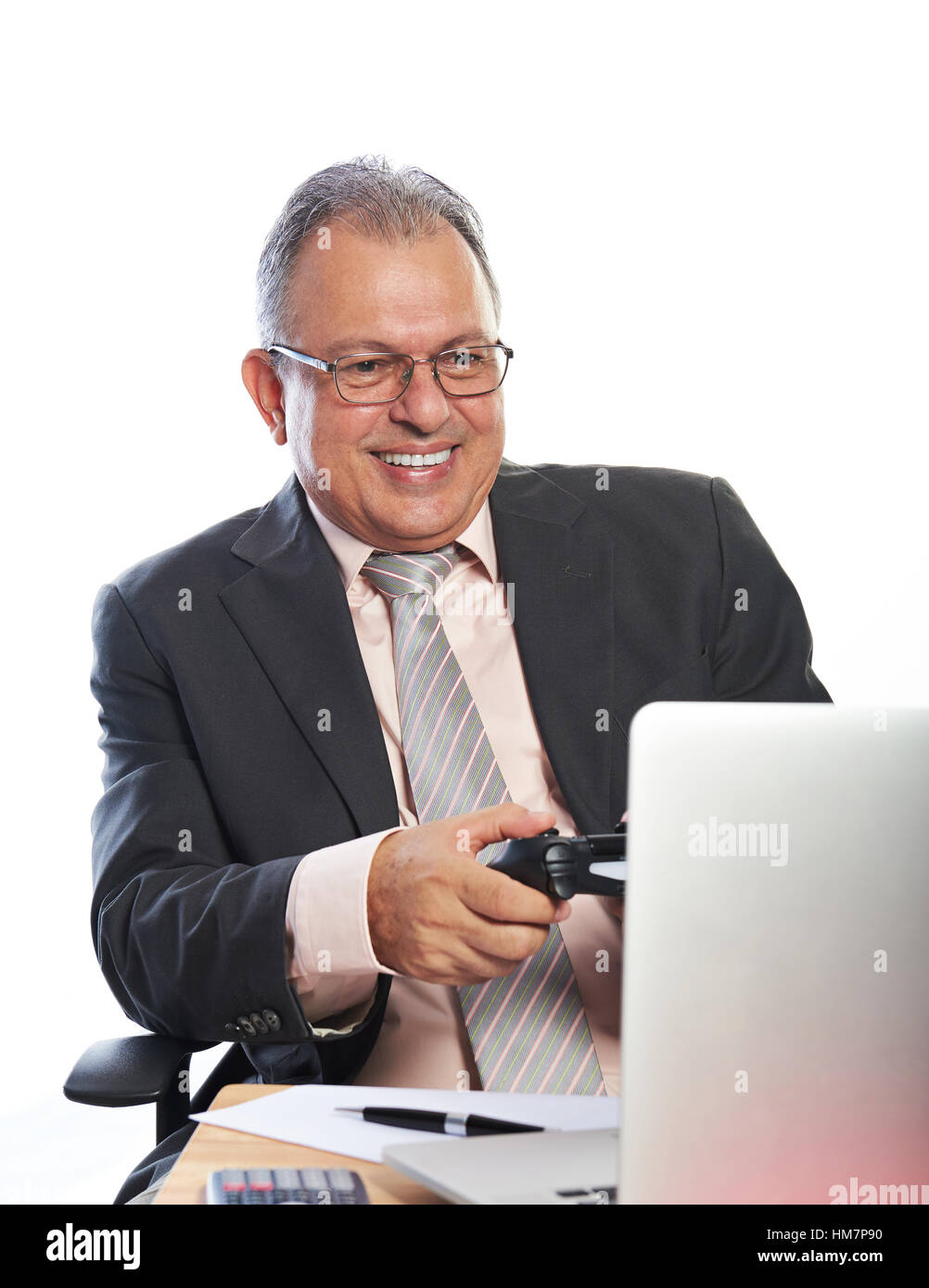 business man play games on working place isolated Stock Photo