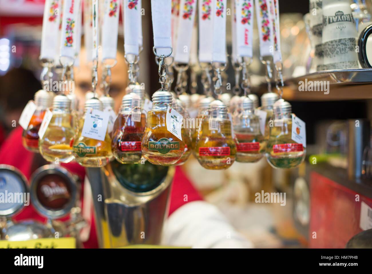 Colourful hanging bottles in shop Stock Photo