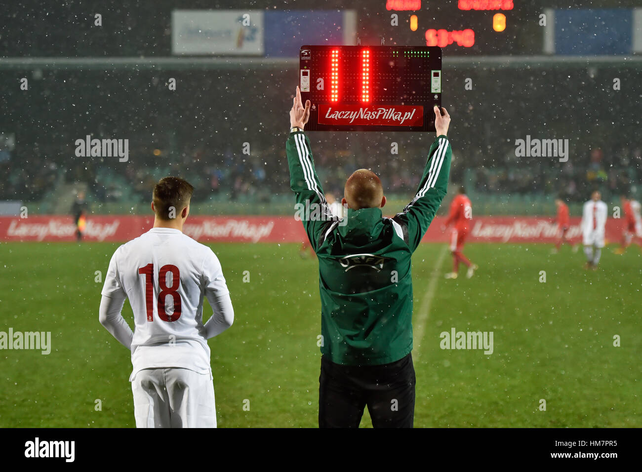POLKOWICE, POLAND - NOVEMBER 10, 2016: Four Nations Tournament U20 national team youth match Poland - Switzerland 2:0. Referee shows substitution play Stock Photo