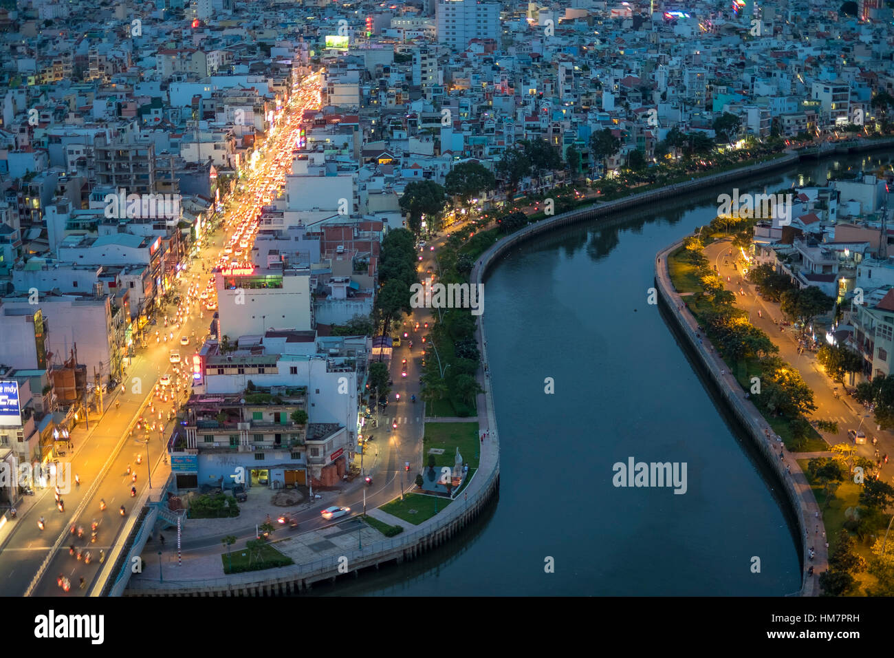 Aerial citynight view of rooftop skyscraper on Nhieu Loc canal in Ho ...