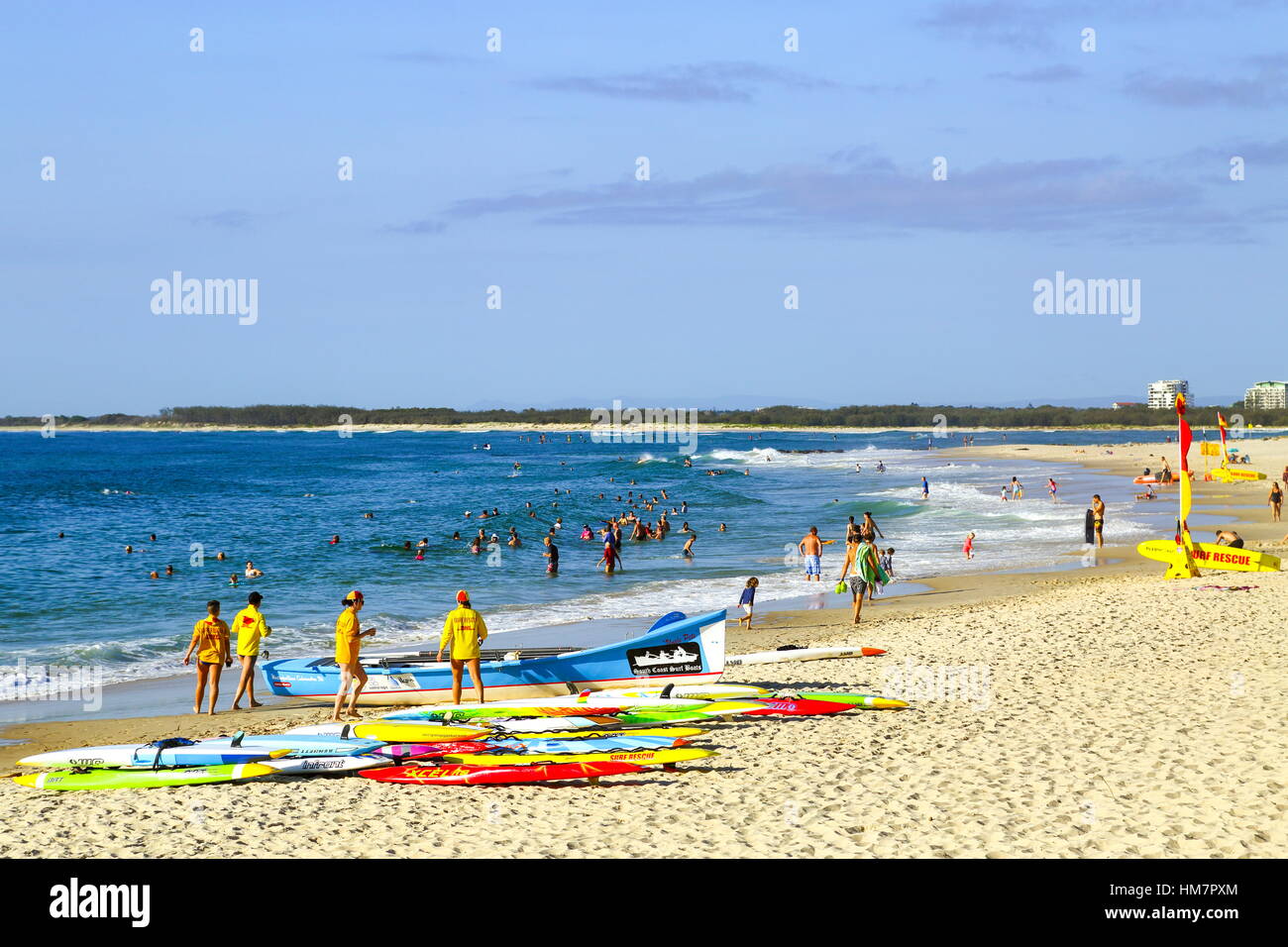 Surf Lifesavers launching a surf boat for some training at Kings Beach on the Sunshine Coast of Queensland, Australia. Stock Photo