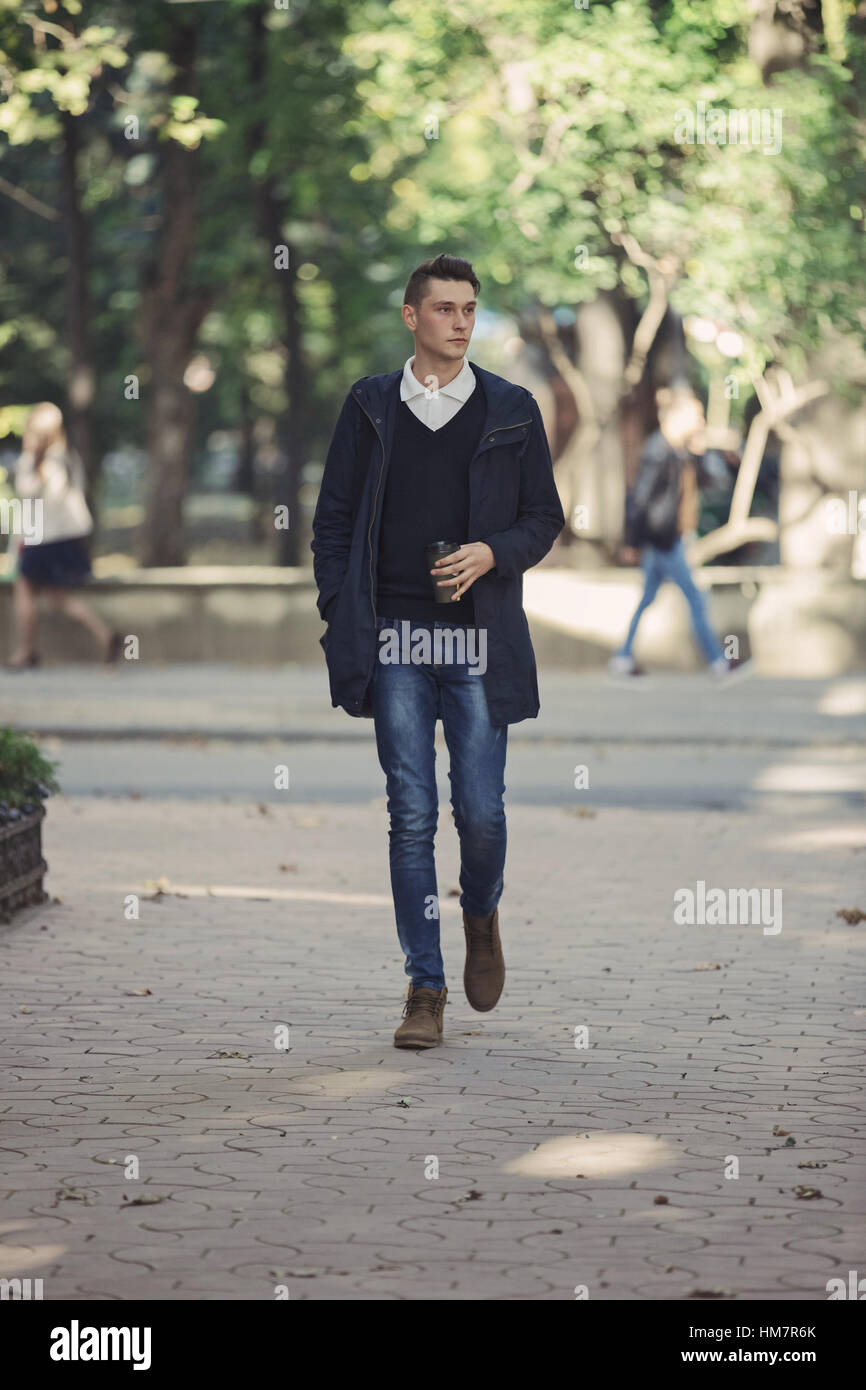 Hipster man walking in the streets Stock Photo
