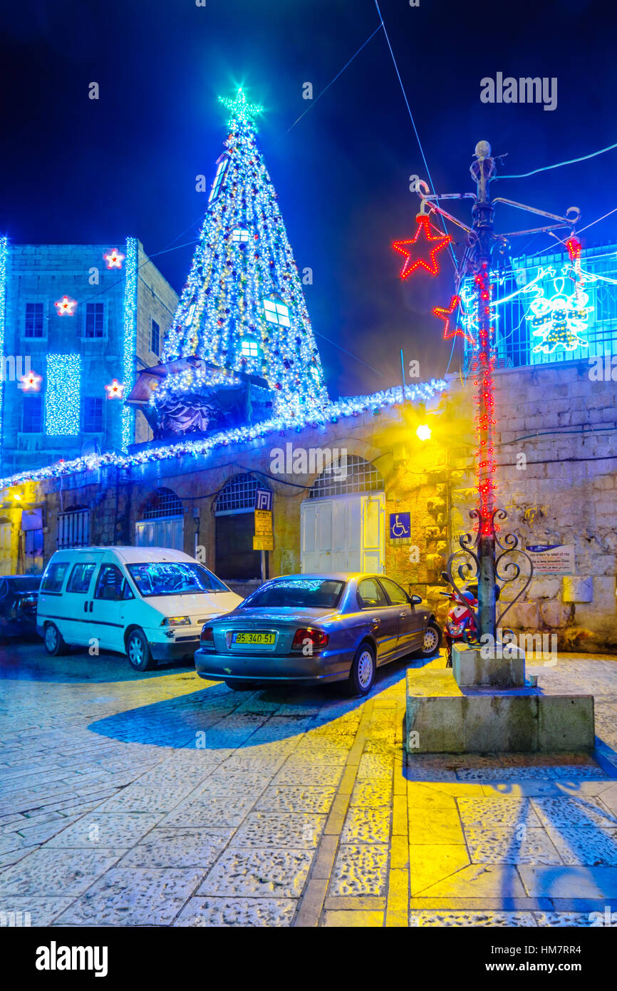 JERUSALEM, ISRAEL DECEMBER 29, 2016 Alley with a Christmas tree and