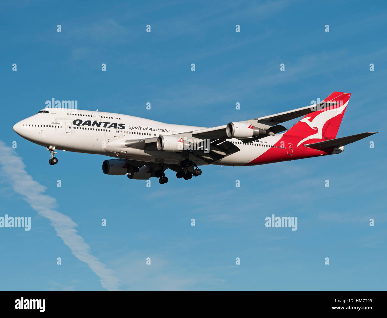 Qantas plane airplane  Boeing 747 (747-438ER) wide-body jumbo jet airliner  final approach landing  Vancouver International Airport Stock Photo