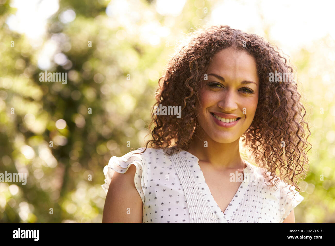 Outdoor Head And Shoulders Portrait Of Mid Adult Woman Stock Photo - Alamy