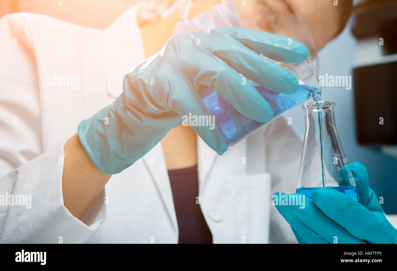 Conducts experiments hi-res stock photography and images - Alamy