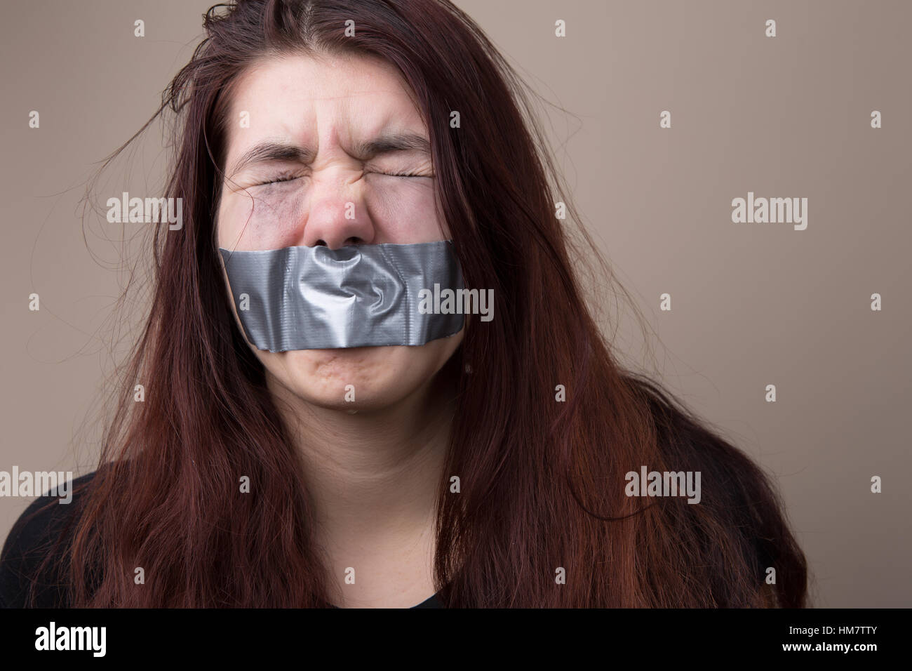 Girl with tape on face Stock Photo Alamy