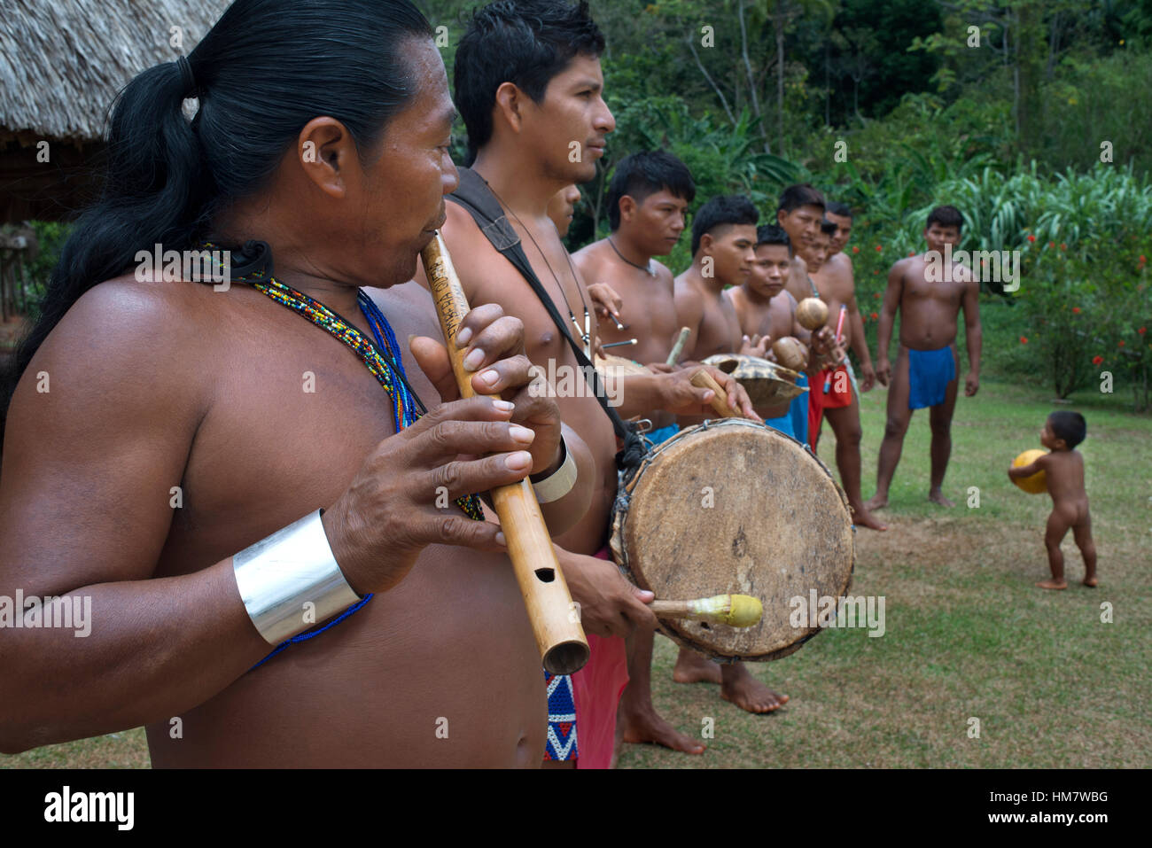 Music and dancing in the village of the Native Indian Embera Tribe, Embera Village, Panama. Panama Embera people Indian Village Indigenous Indio indio Stock Photo