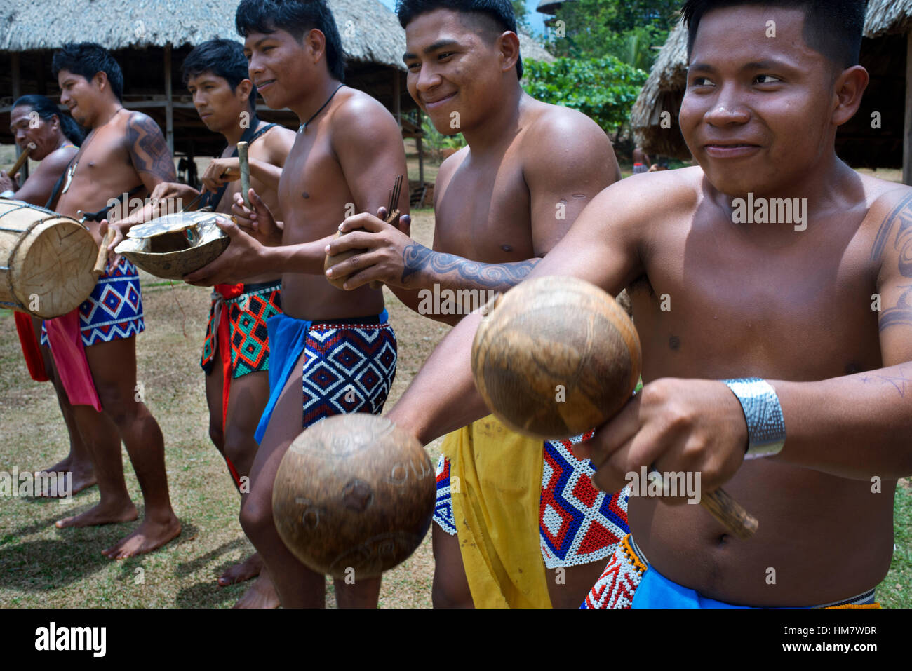 Music and dancing in the village of the Native Indian Embera Tribe, Embera Village, Panama. Panama Embera people Indian Village Indigenous Indio indio Stock Photo