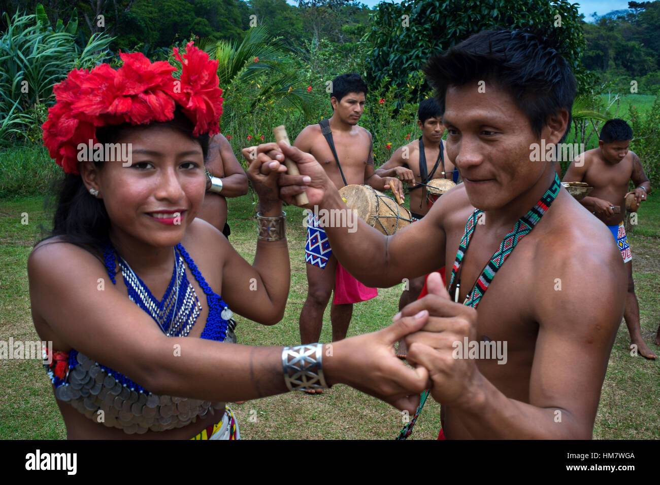 Music and dancing in the village of the Native Indian Embera Tribe, Embera Village, Panama. Panama Embera people Indian Village Indigenous Indio indio Stock Photo