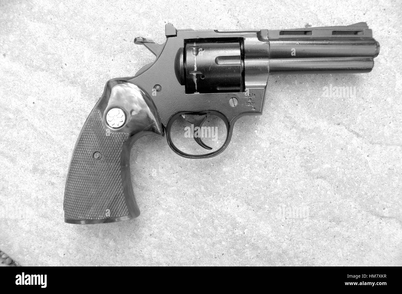Revolver shot in black and white. Stock Photo