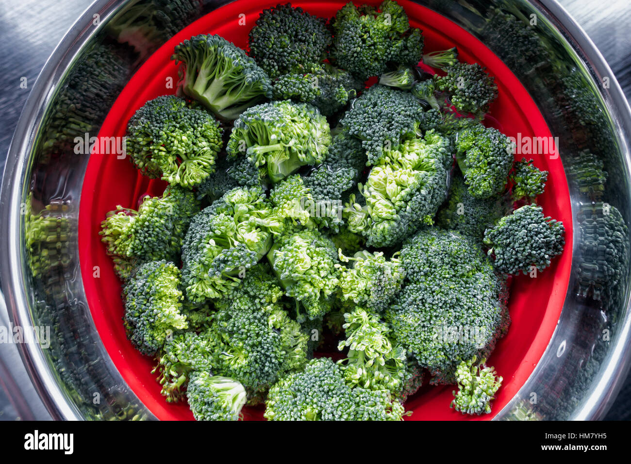 Green brocoli in a bowl with water Stock Photo