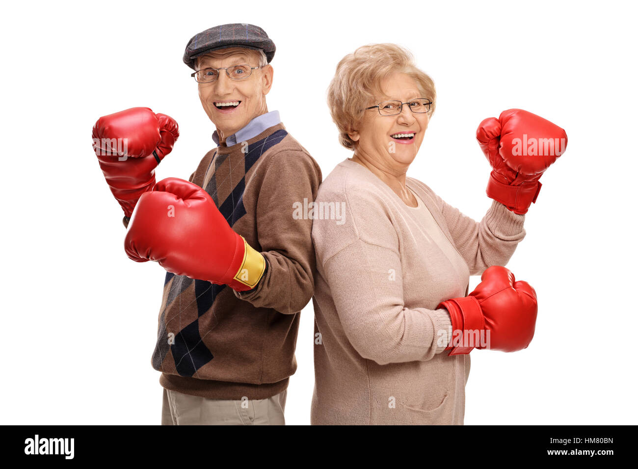 Cheerful seniors with boxing gloves isolated on white background Stock  Photo - Alamy