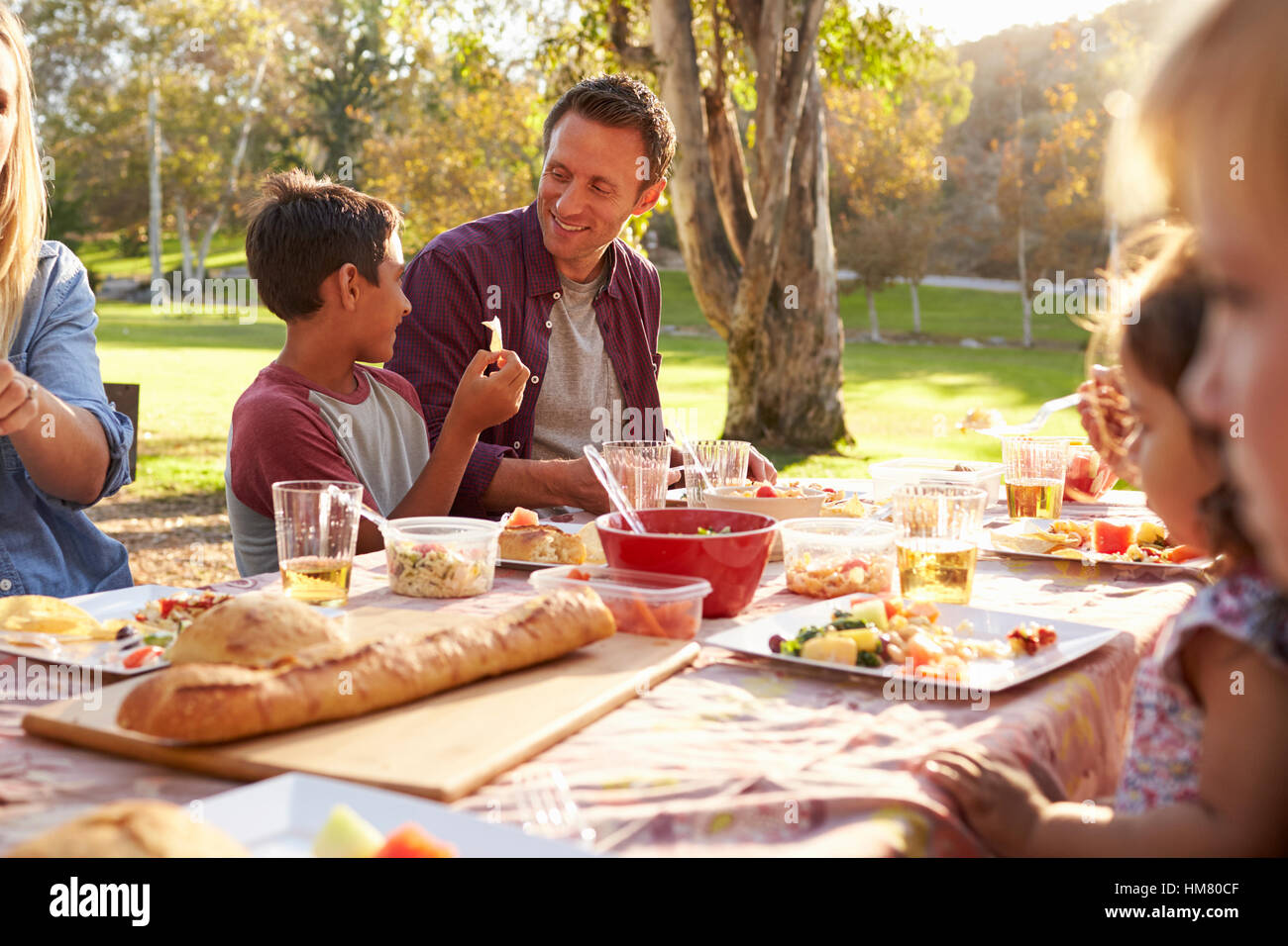 Asian family picnic table in park hi-res stock photography and images ...