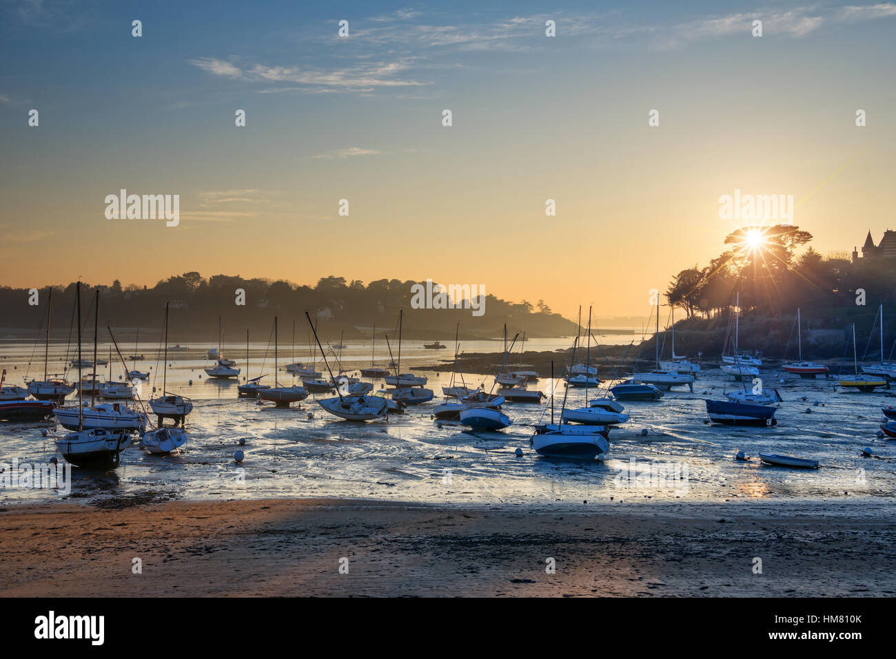 Sailboats at low tide and sunset on the beach of St Briac near St Malo ...