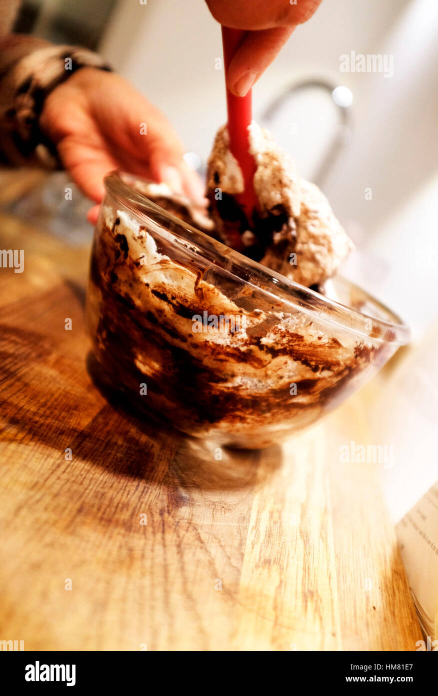 Cook mixing in by hand stiffened egg whites to melted chocolate to make ...