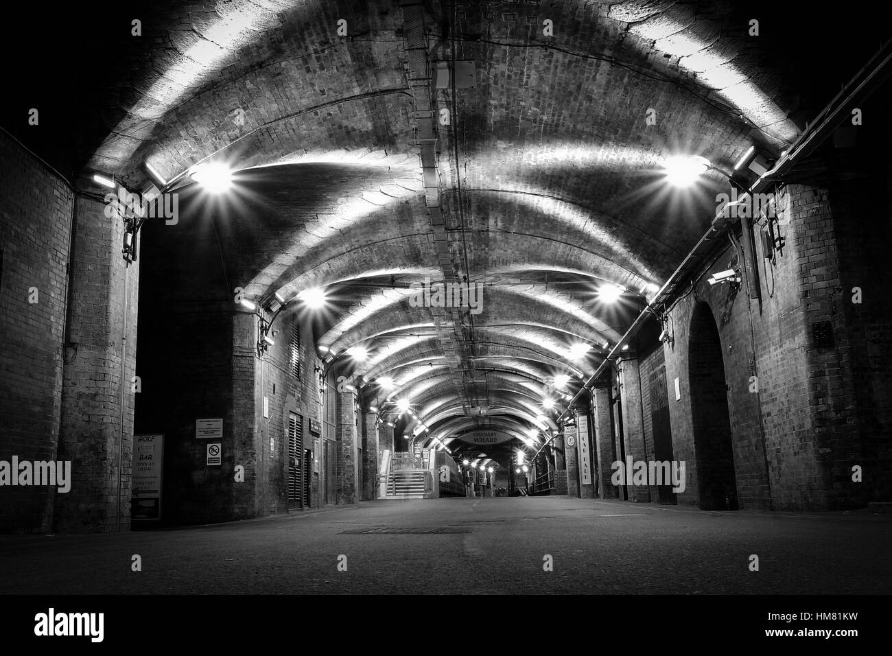 Dark arches of granary wharf Black and White Stock Photos & Images Alamy