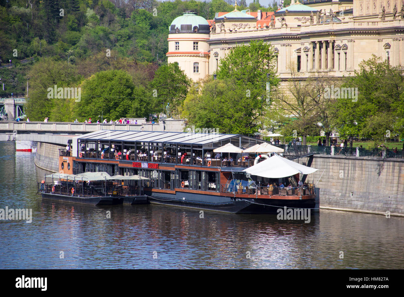 moored restaurant boat by the river Stock Photo