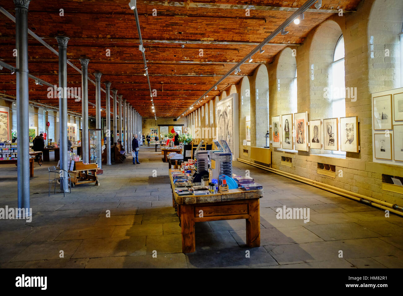 https://c8.alamy.com/comp/HM82R1/art-exhibition-in-salts-mill-saltaire-bradford-west-yorkshire-HM82R1.jpg