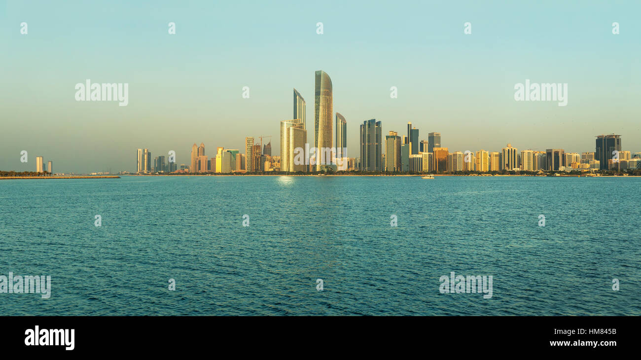 Abu Dhabi Skyline at sunset, View on Al Sahil Beach - Corniche Road West -  Al Khalidiyah, United Arab Emirates Stock Photo - Alamy