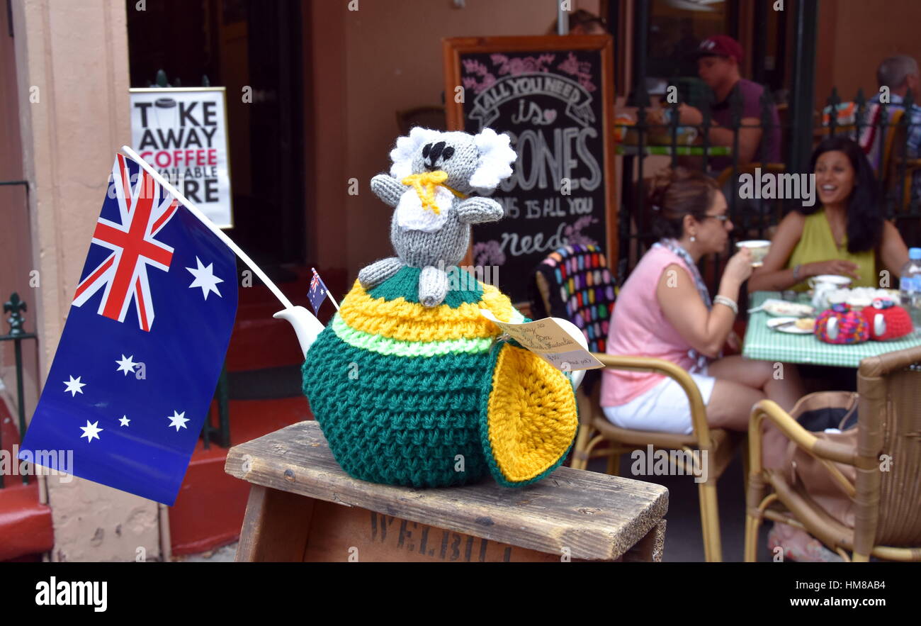 Sydney, Australia - January 26, 2017. Knitten Koala sitting on a yellow and green knitten teapot cosy which was inspired by Australia day. Australia f Stock Photo
