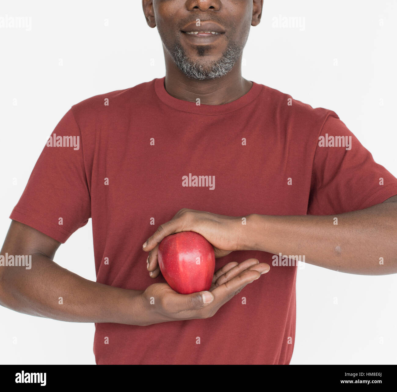 African man holding apple hi-res stock photography and images - Alamy