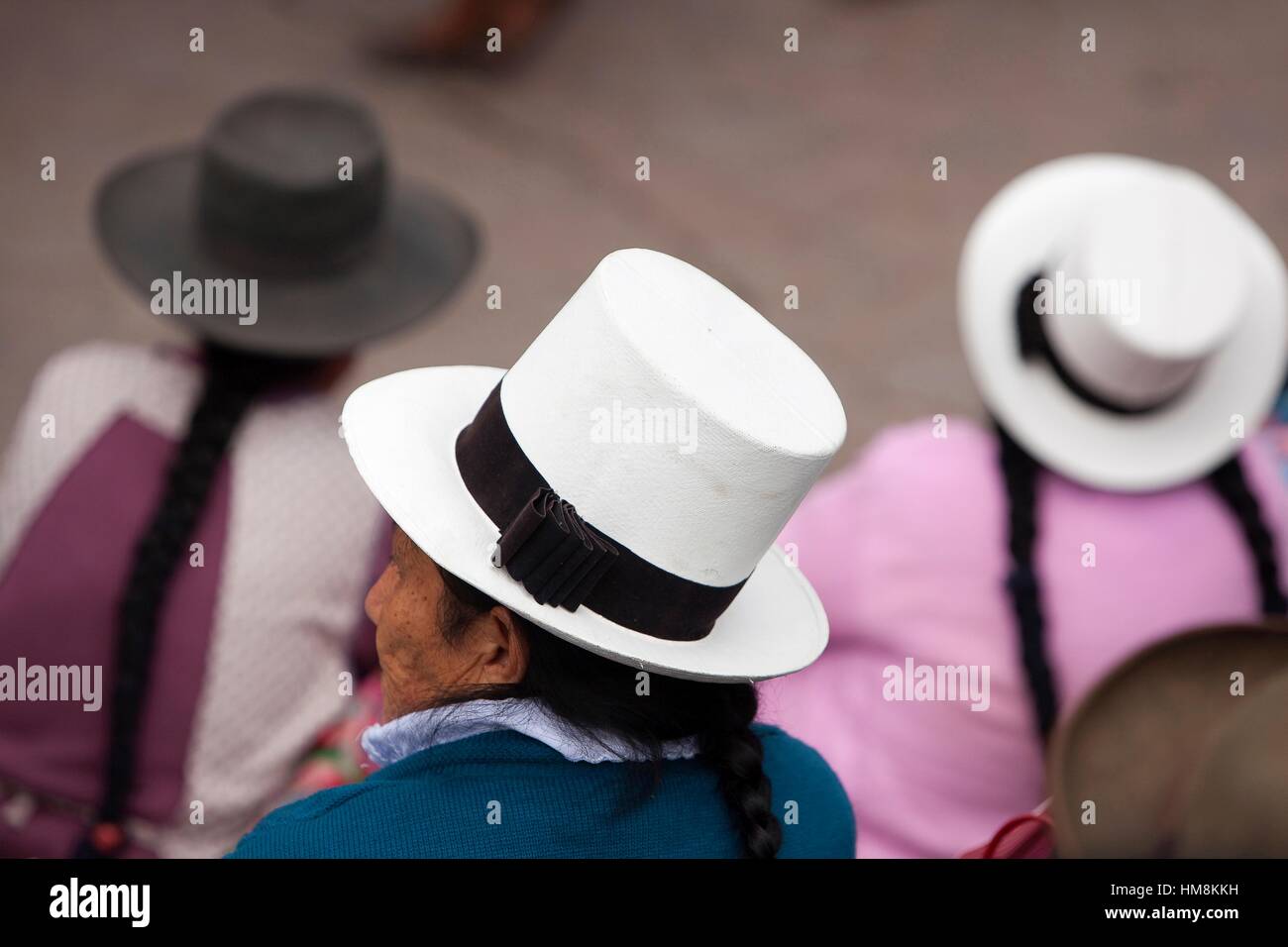 Indigenous people of Cusco with bowler hat and braiding hair, Cusco