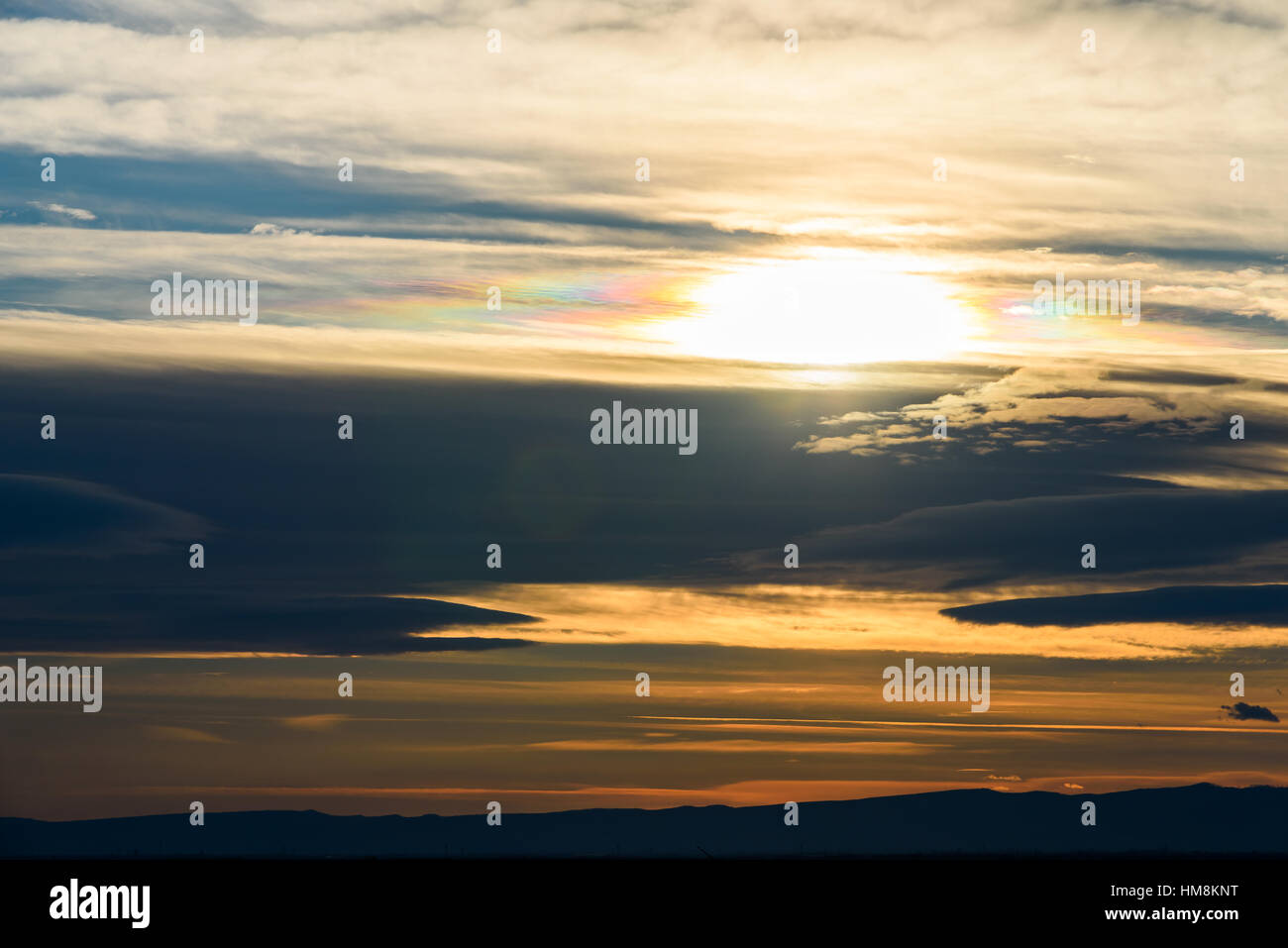 Beautiful Sunset Cloudy Sky Over Mountains Stock Photo - Alamy