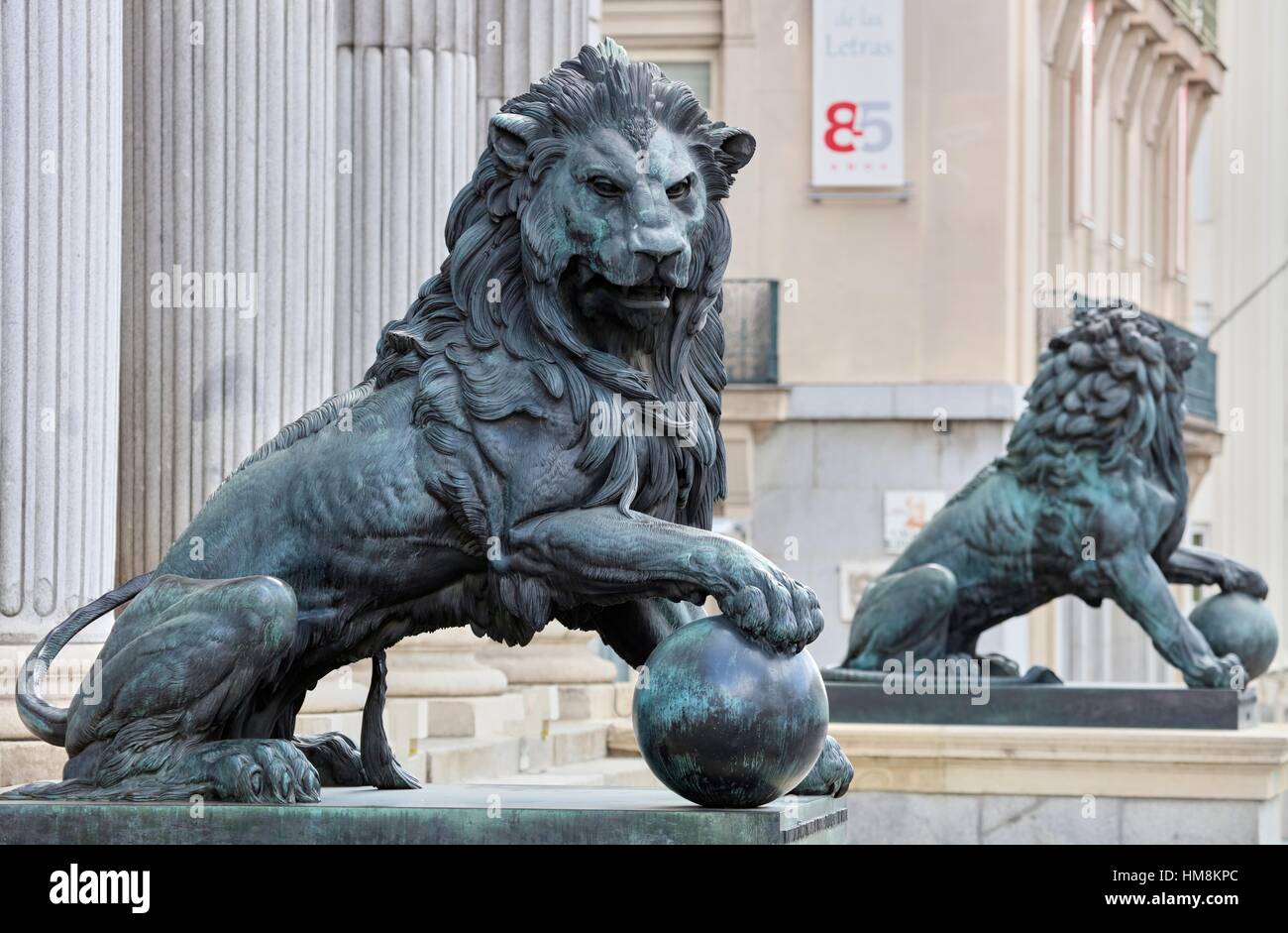 Spain, Madrid, Lion statue at Congress of Deputies (Congreso de los