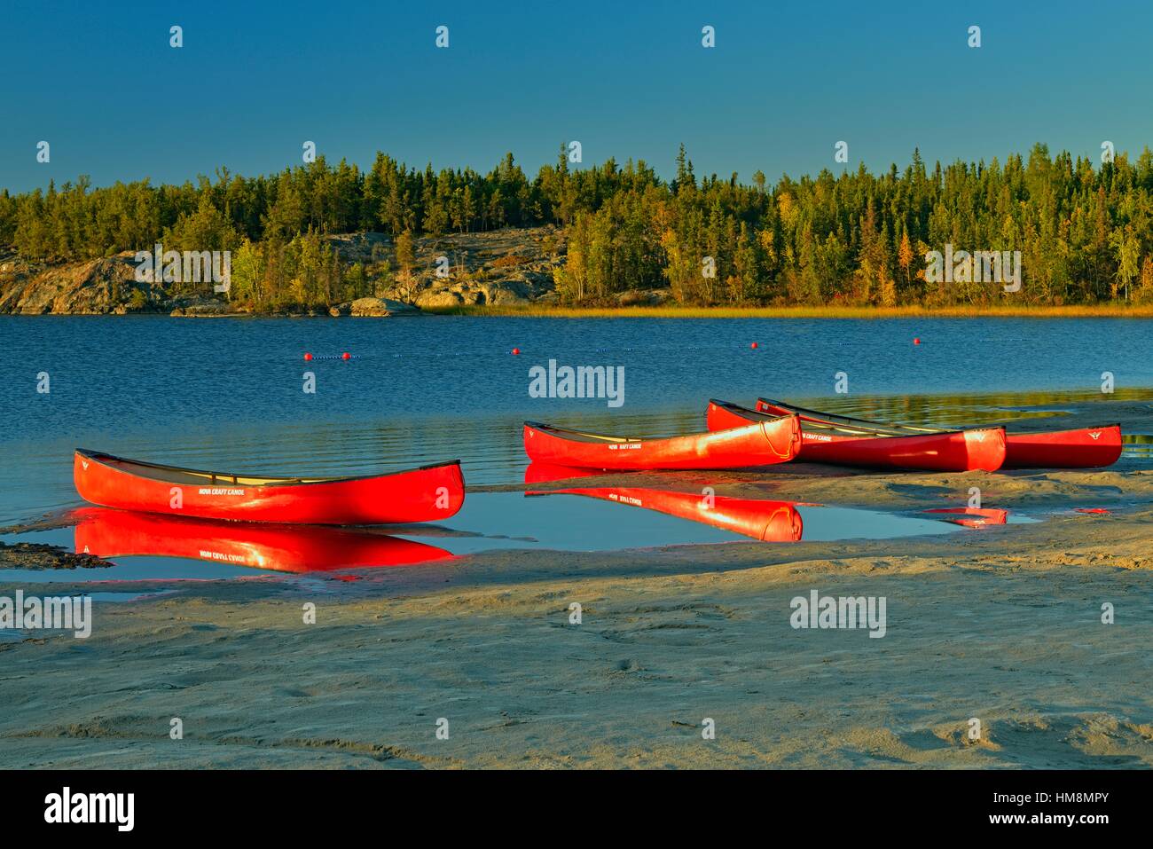 Canoes on shore of Long Lake, Fred Henne Territorial Park, Yellowknife