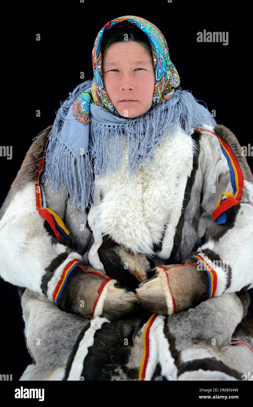 Ekaterina Yaptik, portrait of Nenets herder woman dressed in her winter ...