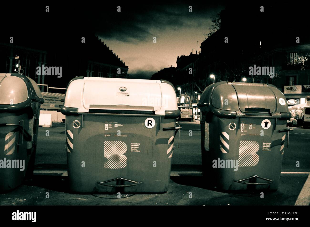 Public garbage containers at dusk, recycling container. Barcelona