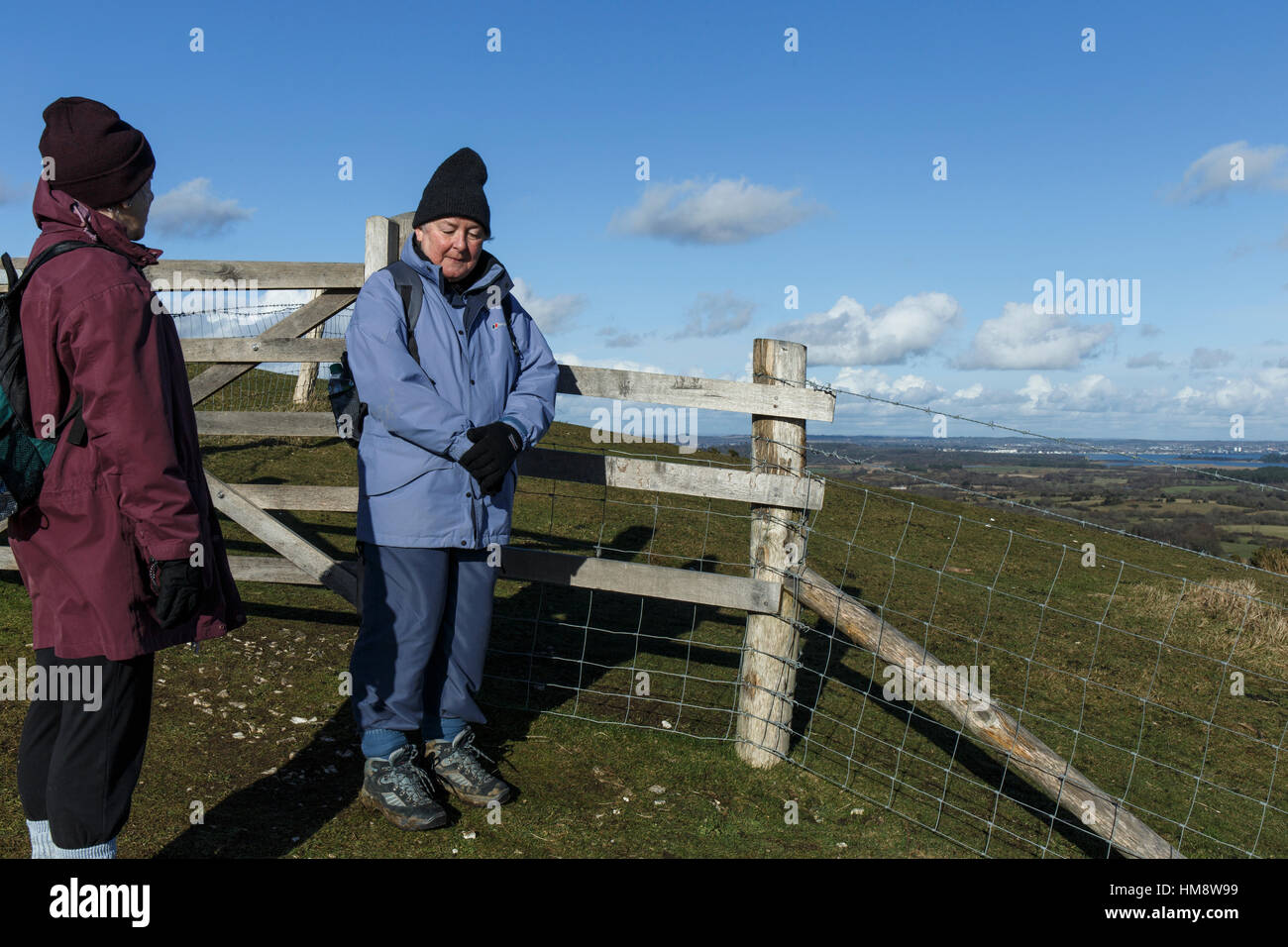 Two walkers on Knowle Hill. Dorset. England. UK Stock Photo Alamy