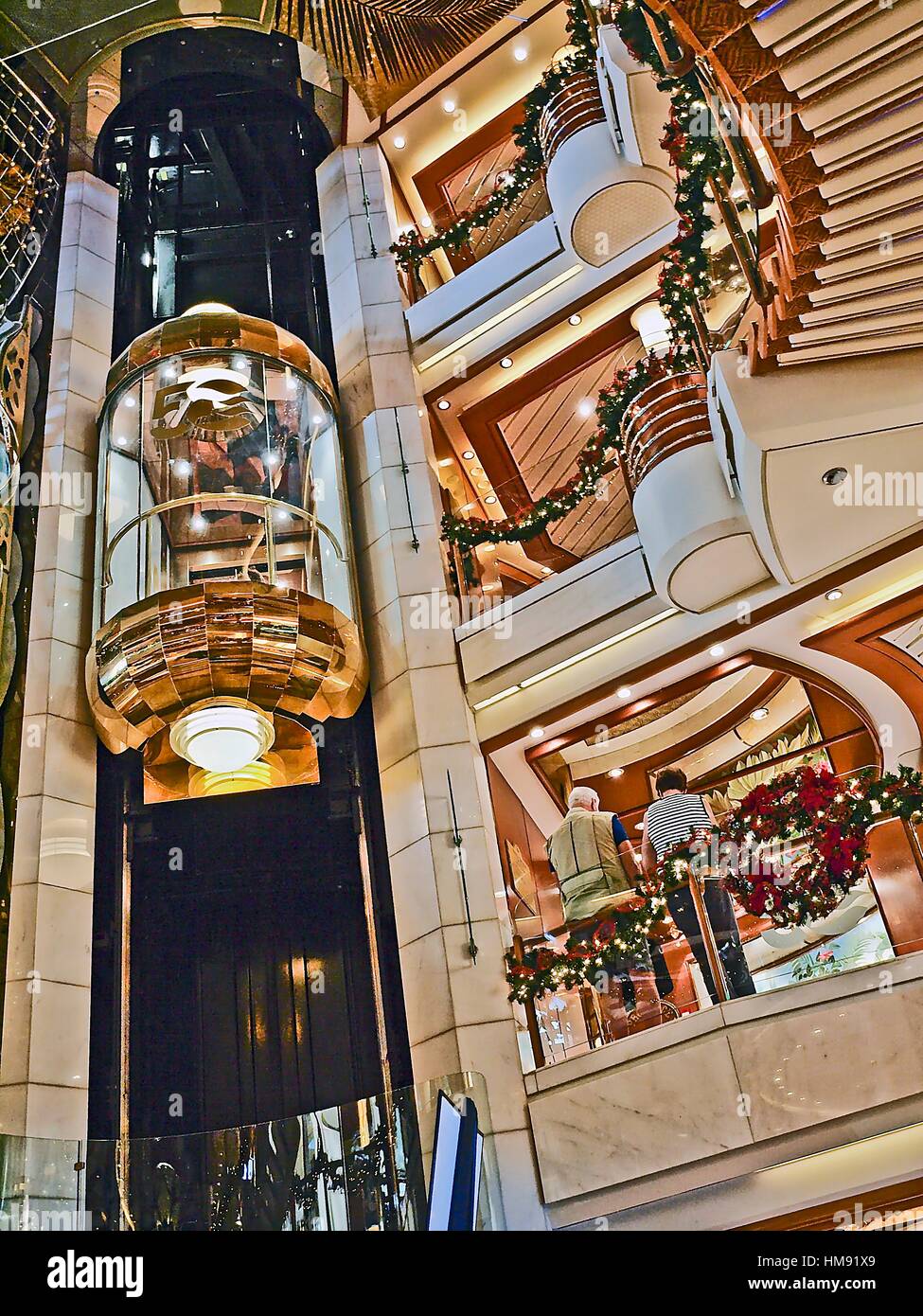 Cruise ship Island Princess Atrium with glass elevator and Christmas