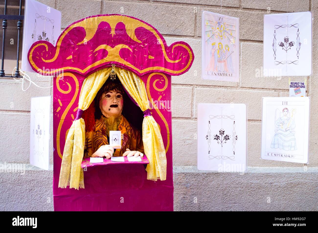 Puppet on a receipt showing tarot cards. Handmade decorations by