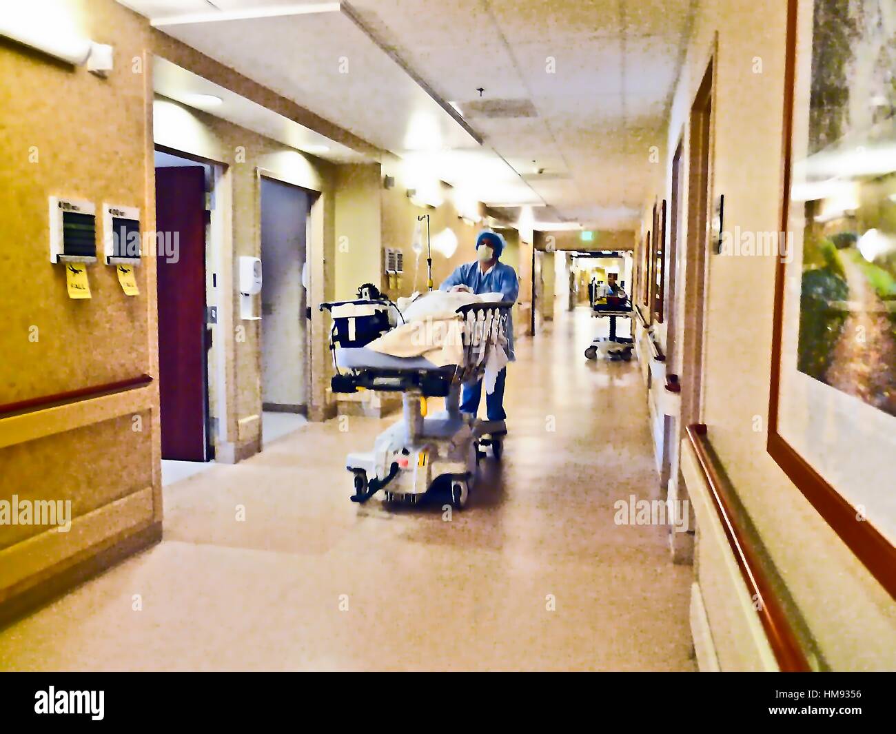 Hospital patient on gurney following surgery Stock Photo Alamy