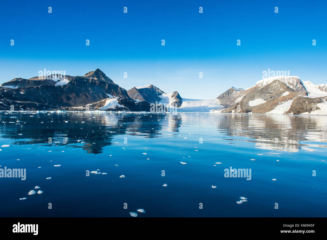 Mountains reflecting in glassy water of Hope Bay, Antarctica, Polar Regions Stock Photo