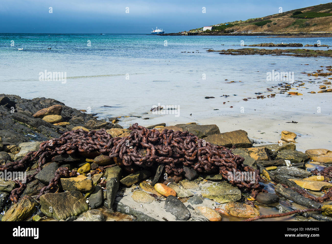 Rusty chain on a beach, Carcass Island, Falkland Islands, South America Stock Photo
