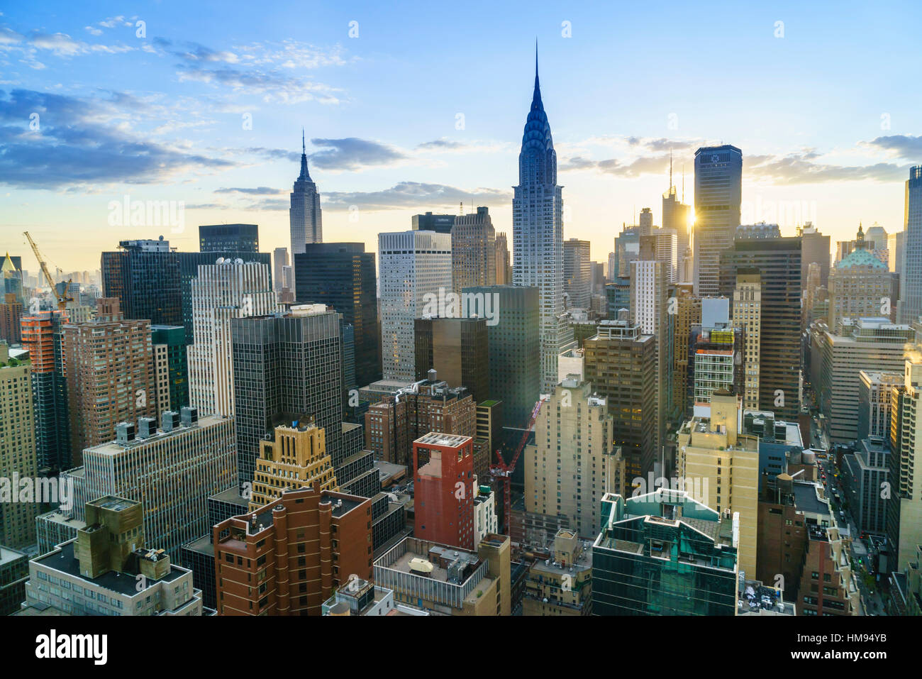 Manhattan skyline, Empire State Building and Chrysler Building at sunset, New York City, United States of America, North America Stock Photo