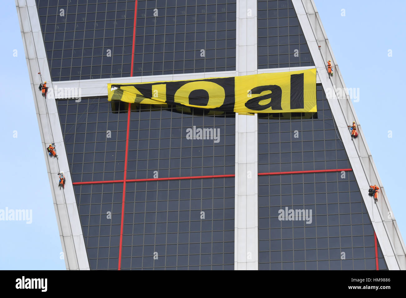 Greenpeace activists scaled the Kio Towers in Madrid to protest against