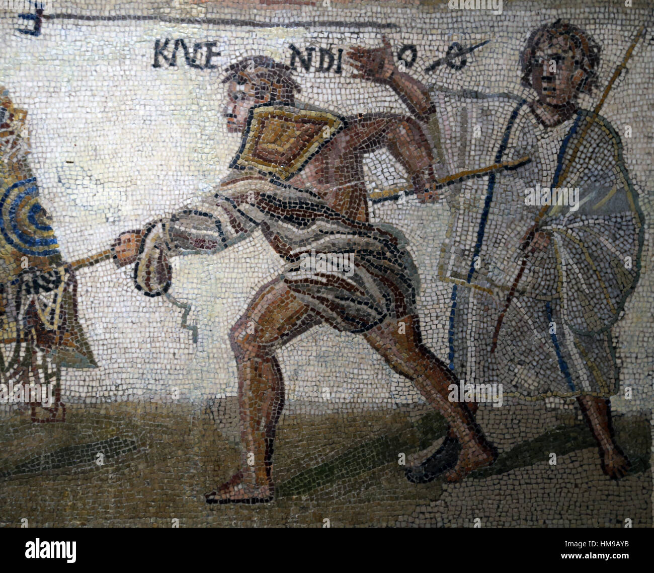 Secutor versus retiarius. Mosaic. Limestone. 3rd century. Rome. Detail. The retiarius Kalendio in mortal combat. Abbreviation o (obiit, death). Stock Photo