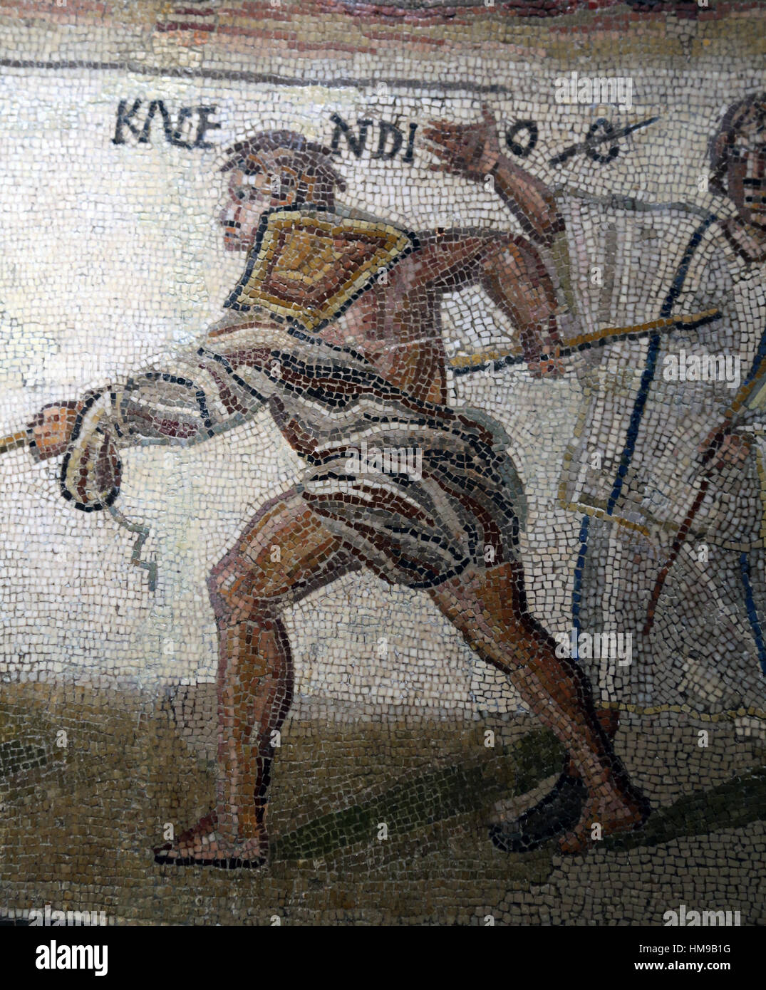 Secutor versus retiarius. Mosaic. Limestone. 3rd century. Rome. Detail. The retiarius Kalendio in mortal combat. Abbreviation o (obiit, death). Nation Stock Photo