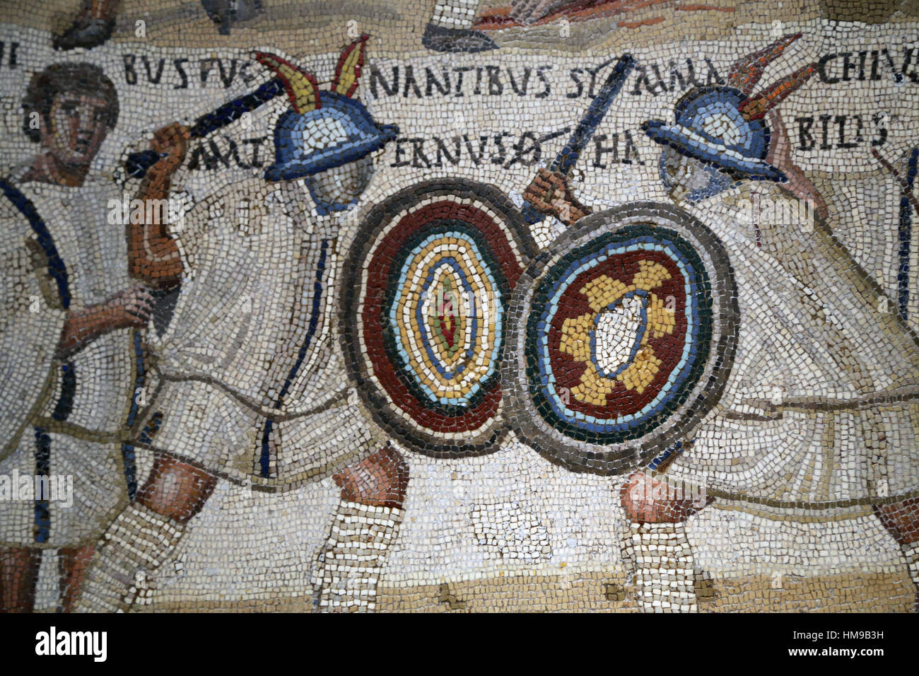 gladiator fight. Mosaic. 3rd century. Rome. Two Eques flanked by two lanistae. National Archaeological Museum, Madrid. Spain. Stock Photo