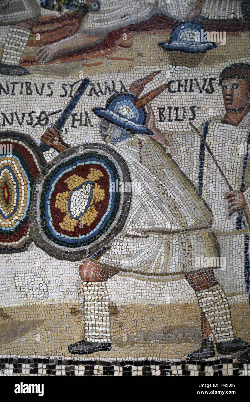 gladiator fight. Mosaic. 3rd century. Rome. Two Eques flanked by two lanistae. National Archaeological Museum, Madrid. Spain. Stock Photo